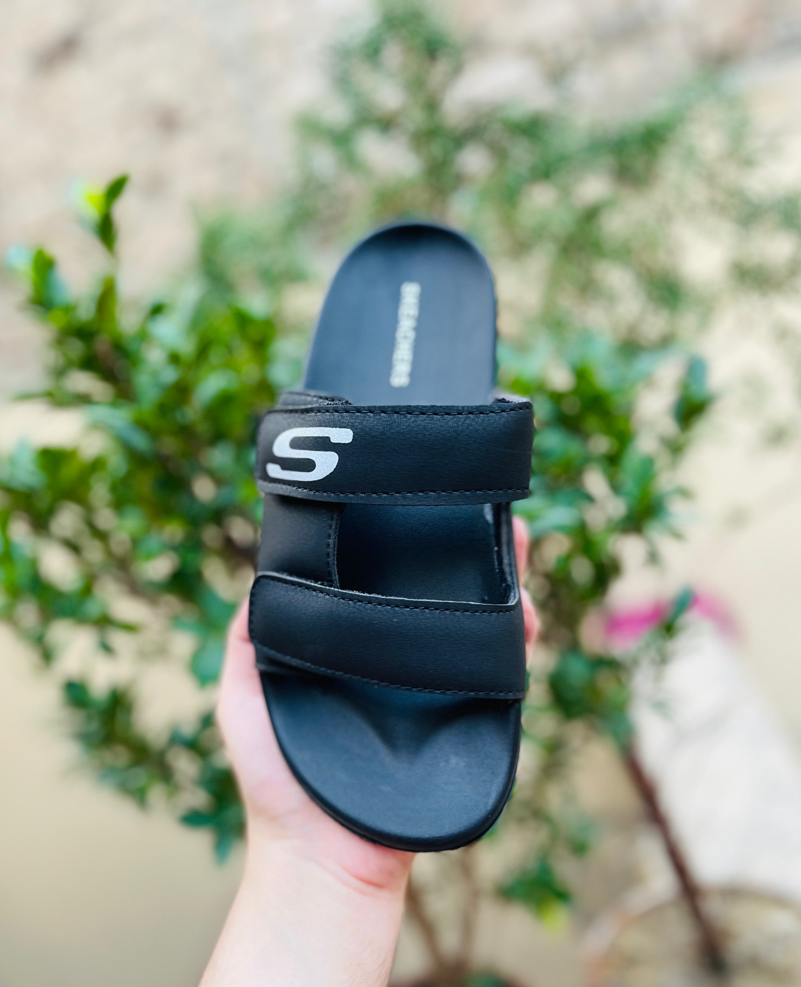 Men's Skechers shoes from SHOE VAULT, stylish and comfortable footwear with a sleek design, suitable for casual wear.